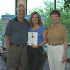 Rosemary and Dave Johnson with Cheryl Ladd, promoting her women's golf book, Token Chick